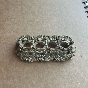 The Bucklers vintage lipstick holder